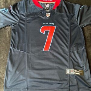 CJ Stroud official NFL H town blue jersey medium.